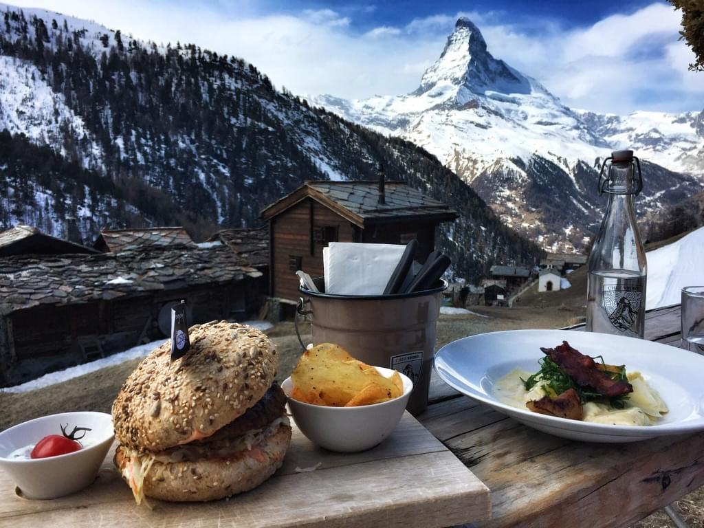 Table with food in front of Matterhorn